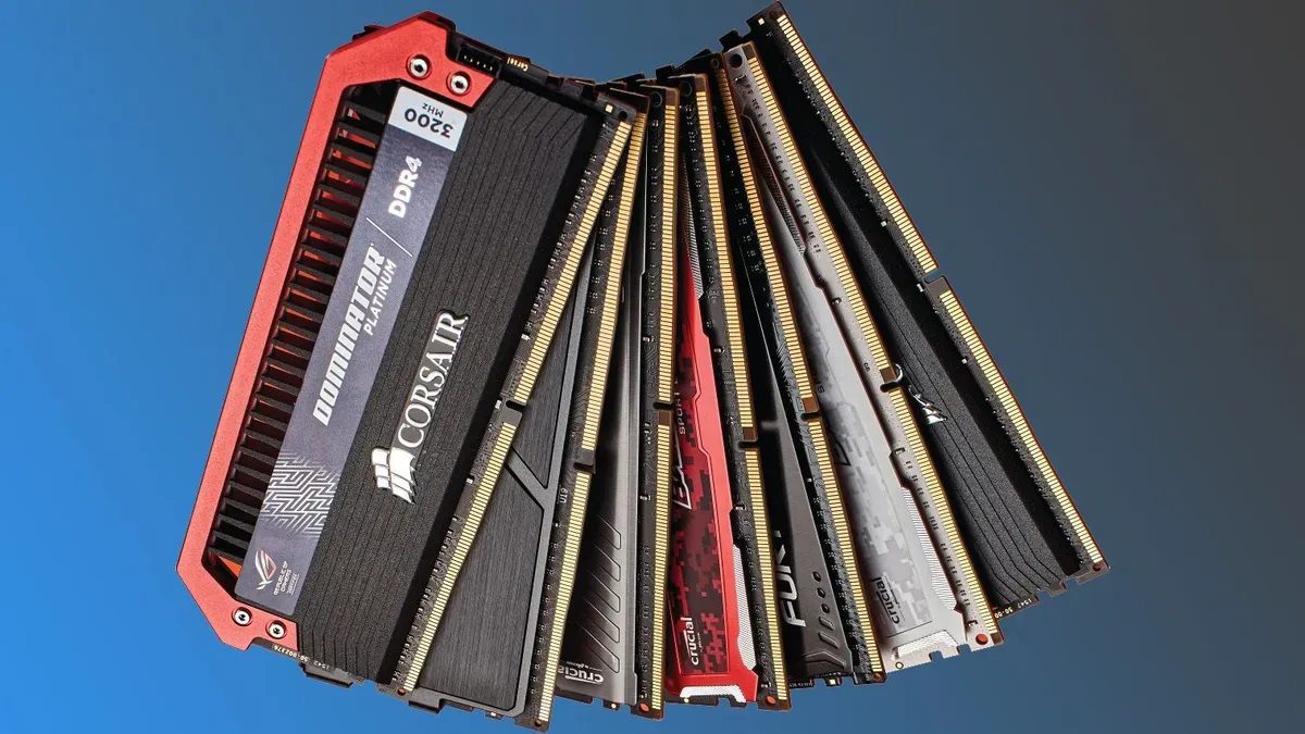 DDR3 memory modules next to a gaming PC with a 6th-gen Intel CPU