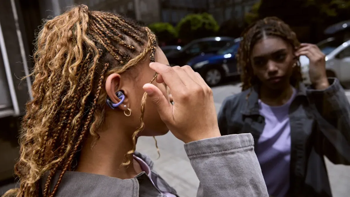 JBL Sense Pro open-ear earbuds with adjustable hooks and charging case