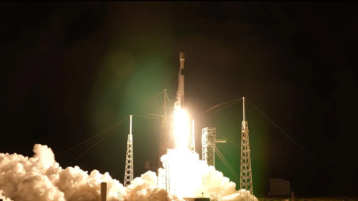 SpaceX Falcon 9 rocket launching with Starlink satellites
