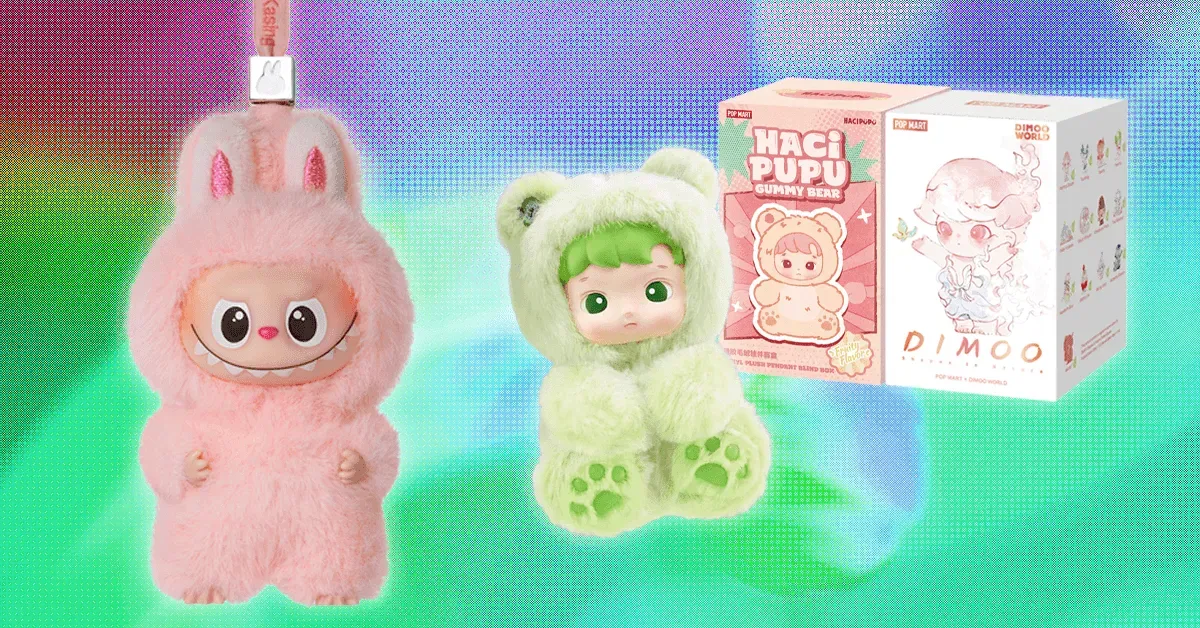 A stack of blind boxes with opaque packaging, some partially opened to reveal vinyl figures and plush pendants