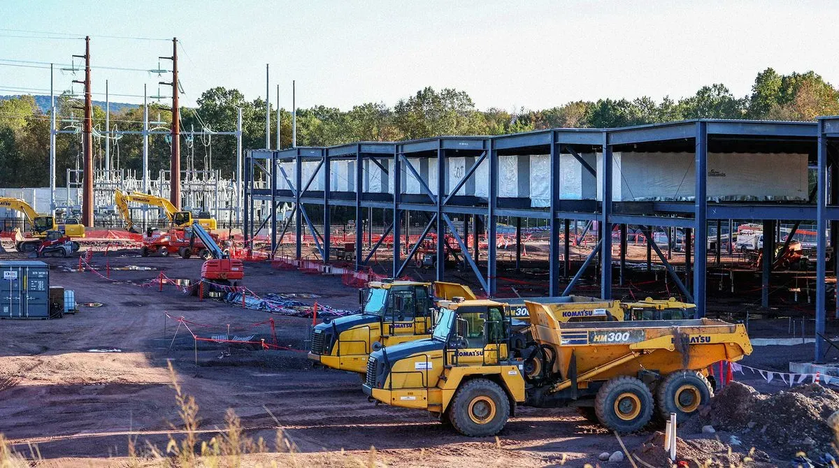 Construction workers installing infrastructure for a data center