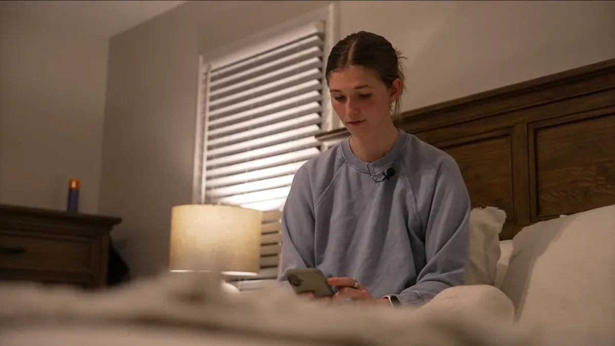 Person checking sleep data on a wearable device